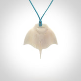 Hand carved bone manta ray pendant. Moana pendants carved by NZ Pacific. Hand made art to wear for sale online.